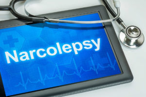 Tablet with the diagnosis Narcolepsy on the display.